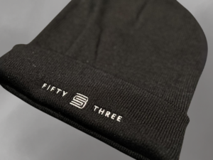 black beanie with the 53 logo